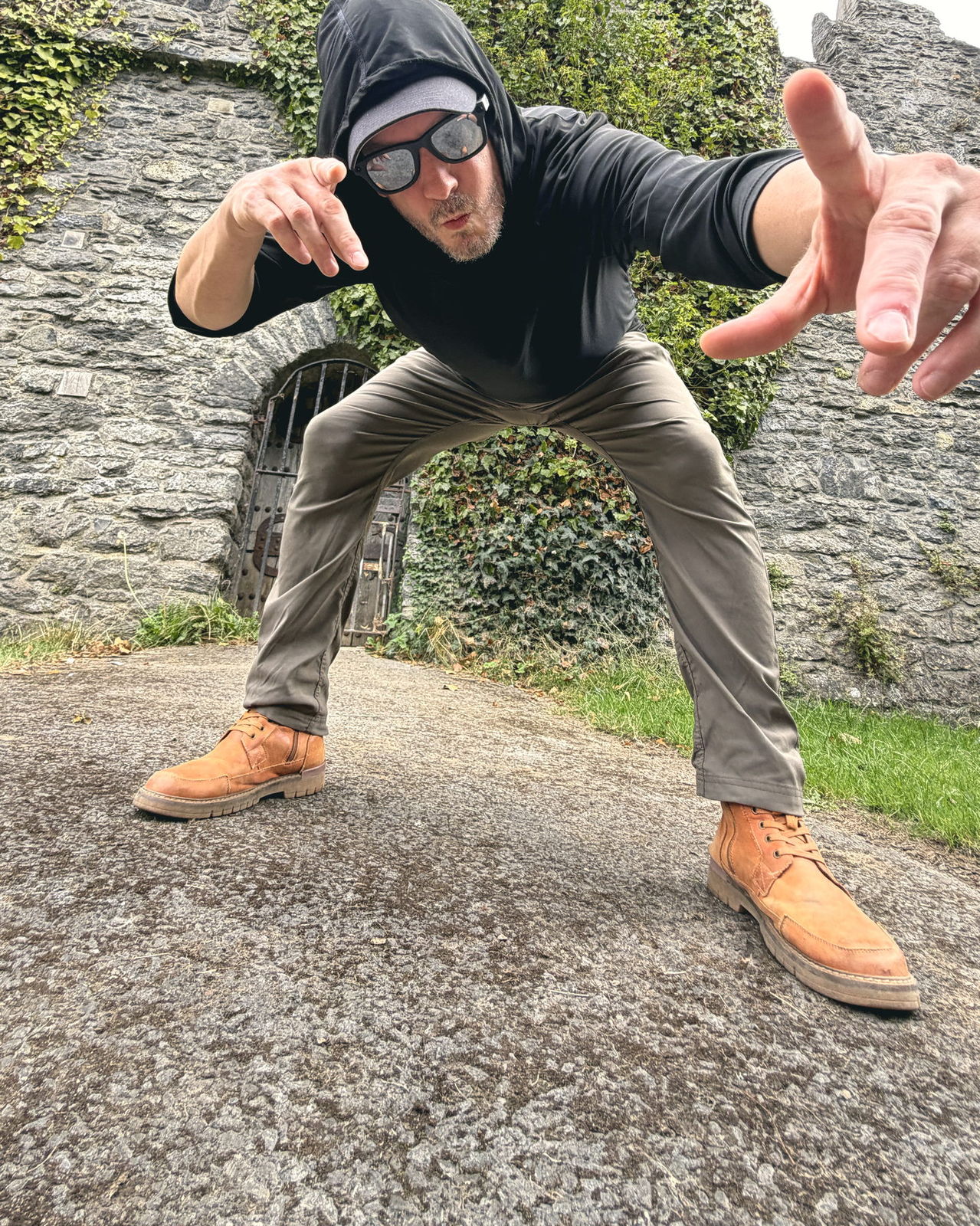 Adam Grumbo in a cap and glasses